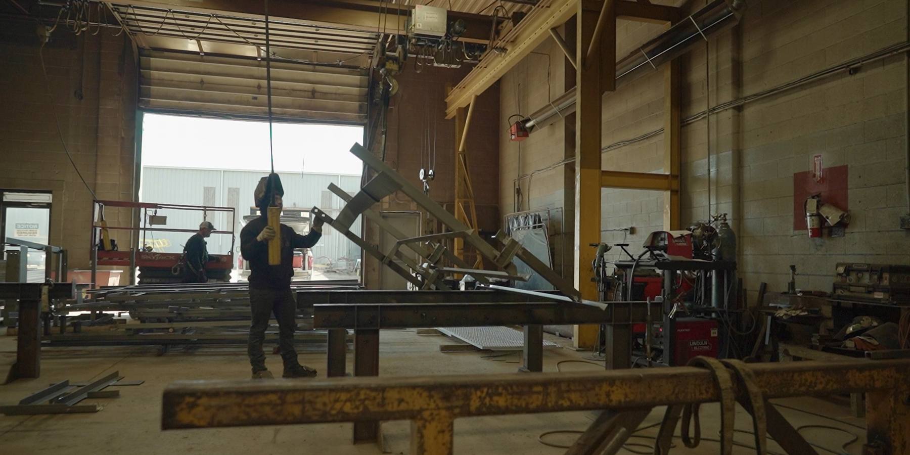Subcontractor crane crew making a lift on site